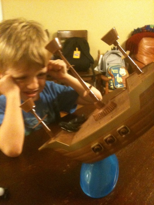 Gee, now I understand where they got the idea for the frustrated pirate on the back of the box of "Don't Rock the Boat."