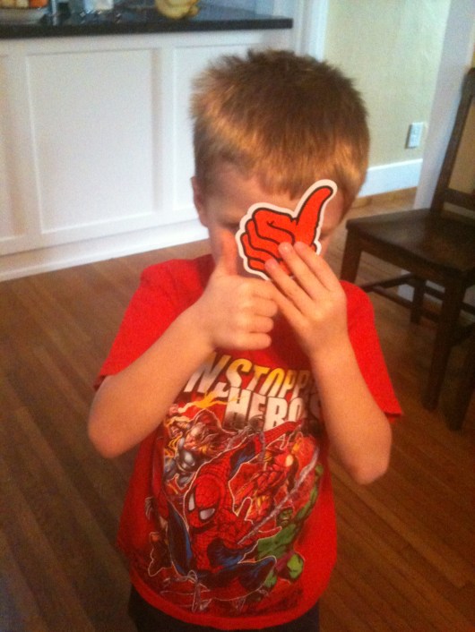 Thumbs Up! T loves his new sticker from Long Beach Skate.