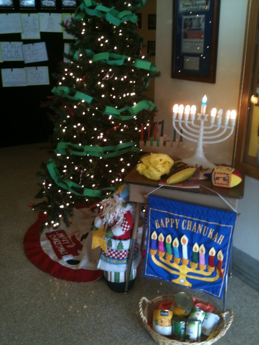 I hope everyone is having (or had) a wonderful holiday season! This was a lovely little display at T's school. I am SO GLAD they recognize most of the holidays this time of year rather than ignore them. Truly lovely.