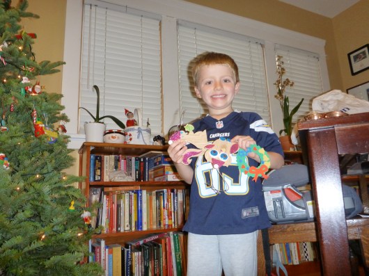 Now those ornaments... grab and hang away, T! Those are some ornaments that T made in season's past.