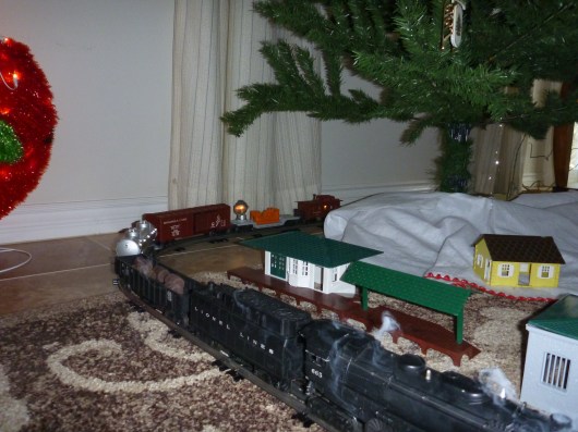 Yes, the train has a working smoke stack and also came with its own set of Plasticville houses and buildings, too!