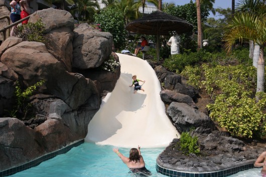 T on his way down the longer of the three slides at the Kohala Pool (taken Spring 2012).