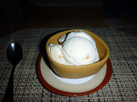 At my last meal on the Big Island, I FINALLY tracked down a scoop of Tropical Dreams' Macadamia Nut Ice Cream. RMT'ers, if they sold stock in this, I'd buy. For being so cold, crunchy, and creamy, it's also one extremely hot commodity!