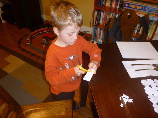 T making his snowflake for Sandy Hook Elementary. He just thinks it's homework, and that's fine with me.