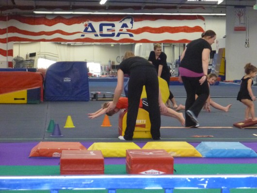 T gets a little help with his "superman" move during his trial class at AGA.
