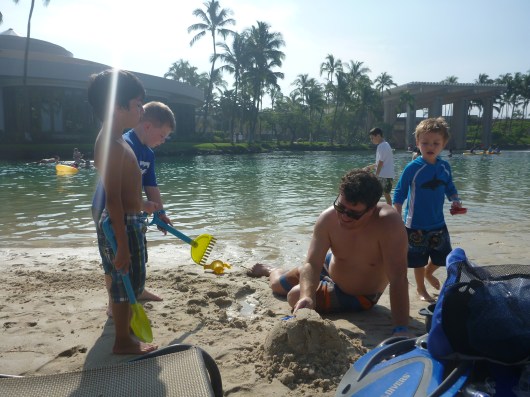 A common sight every day while on vacation: T and his "vacation friends" with C digging in the sand and building a sand castle of some sort together. I think this was the turtle. They also made a monorail, a superhero hideout, and some other creatures together over the span of several days.