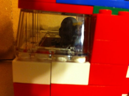 Chewbacca at the controls of T's version of the Millennium Falcon. 