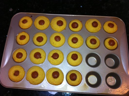 Ten minutes later (give or take) and you have about 20 mini-muffin corn dogs! Easy, fun, and kid-friendly!