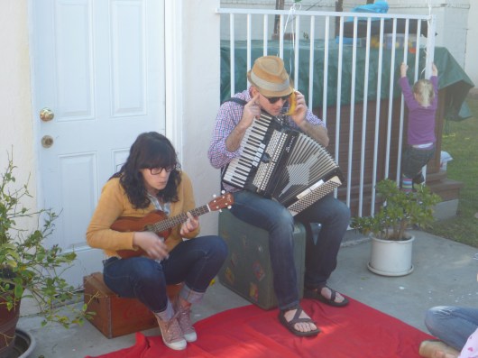 Hello? Who's this? Andrew answers a "banana phone" while Polly plays along to the kiddie (and parent) crowd. This duo is music to ears of all ages on LA's West Side.