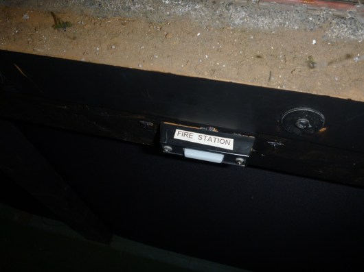 Even the smallest engineers can operate the set-ups at AGHR in San Pedro, CA. Buttons like this one operate different light and motion sensors inside of the scenery along the O-gauge tracks.