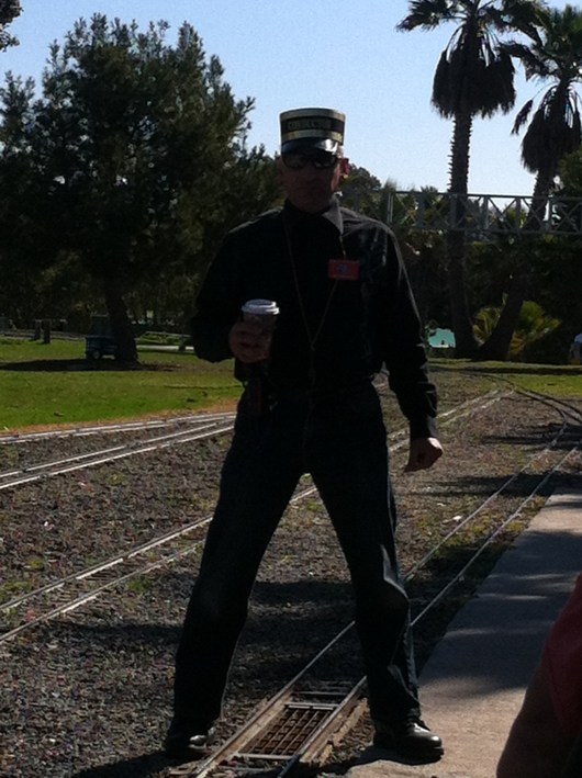I want YOU to book your next birthday with OC Model Engineers! Kidding, but I loved this photo of the engineer with his coffee in hand, ready to chug-chug.