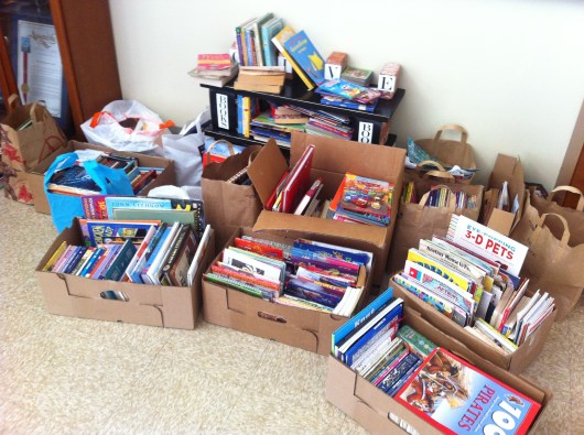 Lots and lots of books! This was as of yesterday morning. Oh, the places so many kids will go now that they'll have all of these books!