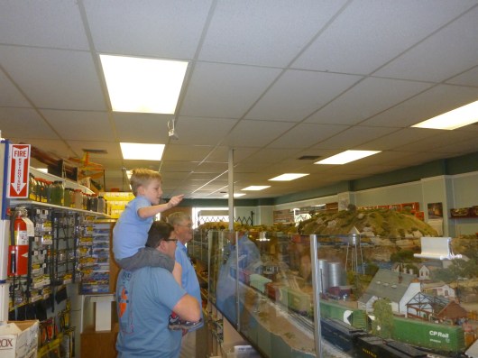 A now 5-year-old T still enjoys looking at the trains down at Dynamic Hobbies.