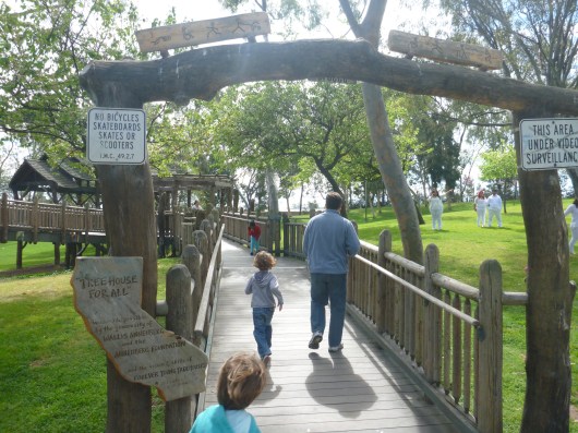 T and C walk into the Charles Wilson Community Treehouse in the park of the same name in Torrance, CA.