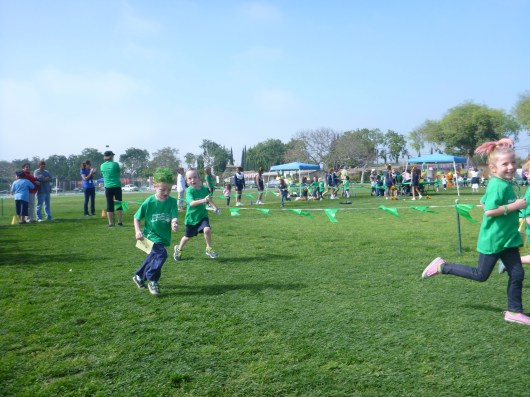 T and his buddy J running in their first jog-a-thon together. They attended preschool together also.