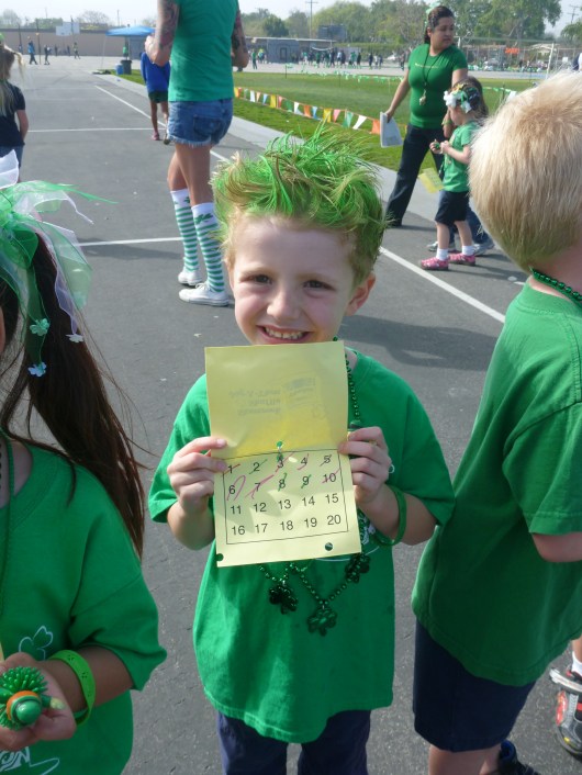 T with his jog-a-thon lap card. He ran 10 laps! Way to go, T!