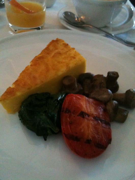 My breakfast in BA's First cabin: Cheese fritata with grilled tomato and mushrooms.