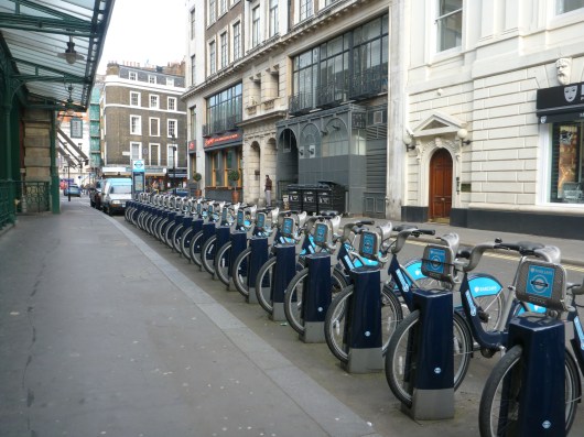 Some commuters and vacationers choose rent-a-bikes to get around London. Many parklets like this one in Covent Garden house a set of rental bikes that allow folks to pick up in one location and drop off in another.