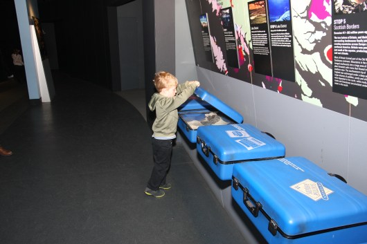 T checking out the suitcases in a geology gallery at NHM, London.