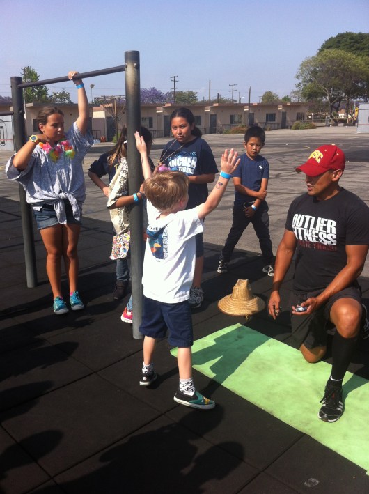 T did 30-something jumping jacks in 30 seconds, meeting the 25-count challenge at the school carnival. Go T go!