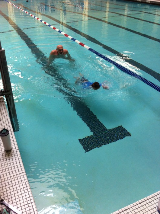 T freestyling with Coach Bob at Silverado Pool in Long Beach.