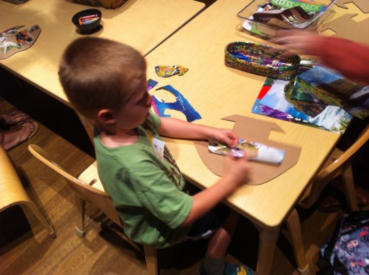T gets to work making his own ark at the arts and crafts station at Noah's Ark inside of Skirball Cultural Center.