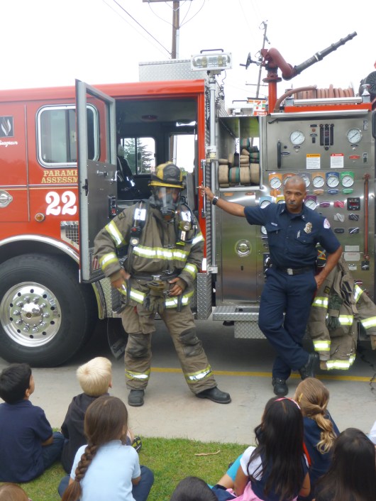 Darth Vader, um, I mean the fire fighter from Station 22 showing off his full garb to the kids during the class field trip.
