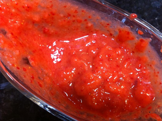 The strawberry puree I made for my ice pops. Notice it's not overly liquified but retains some berry chunks here and there throughout