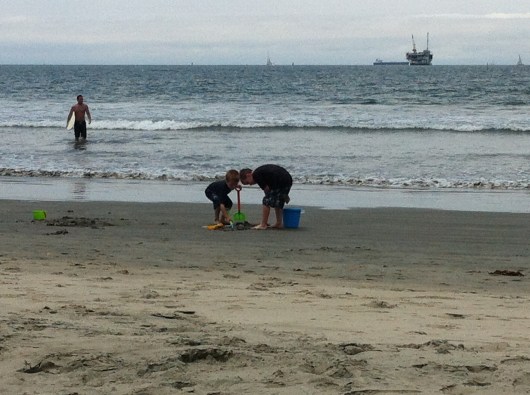 T and his new friend playing at Seal Beach on the 5th of July, or just another gorgeous day in Southern California!