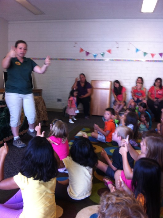 Wildlife Learning Center educator Alicia shows the audience that a "thumbs up" is the appropriate response to when we see something we like. Loud noises tend to spook the animals, so it was an applause-free afternoon, but one with many more than just two thumbs-up!