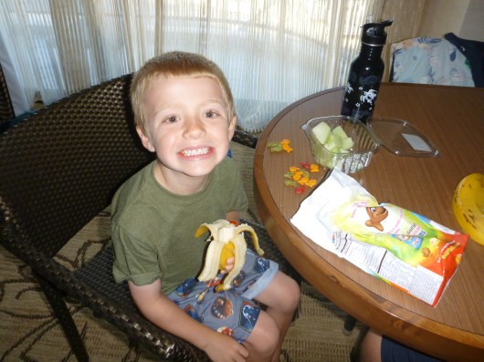 T enjoys his "breakfast" - it's not much of the hearty variety, but we tend to snack on-off all day when we go to Hawaii anyway, so why not start early?