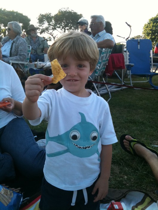 T is excited about "snack dinner" during the concert he attended in 2011 (3-1/2-years-old here).
