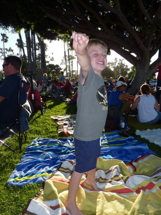 A 4-1/2-year-old T is set to take off at the concert in the park last summer (2012).