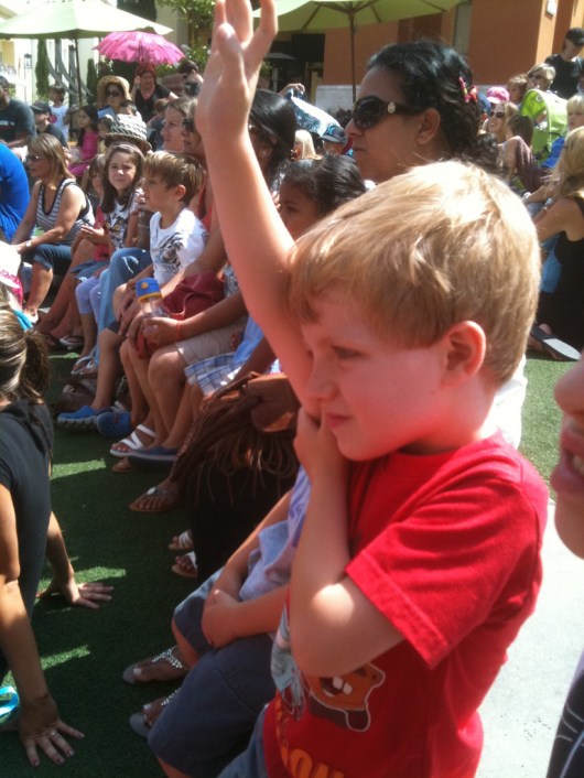 Pick me, pick me! T really looks forward to the chance to be in the Bella Terra Kids' Club shows each time we go.