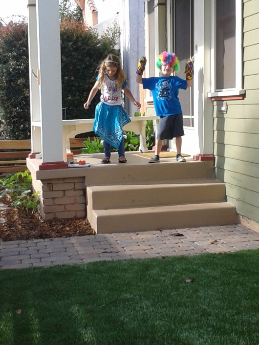 Two friends all dressed up and goofing around is what summer's all about.