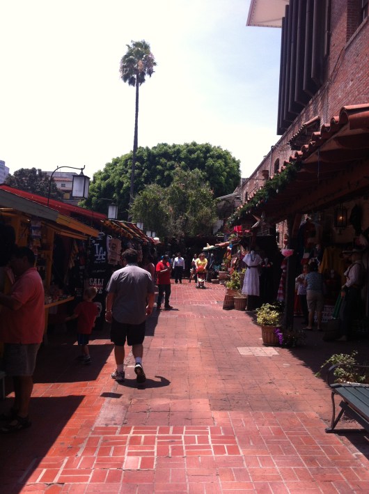 C walking up historic Olvera Street, AKA the birthplace of Los Angeles.