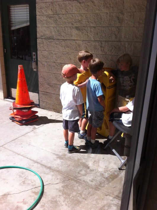 T playing in the yard just before I picked him up from Pee Wee camp. Who knows what these boys were doing, and that's OK with me. Have fun, T!