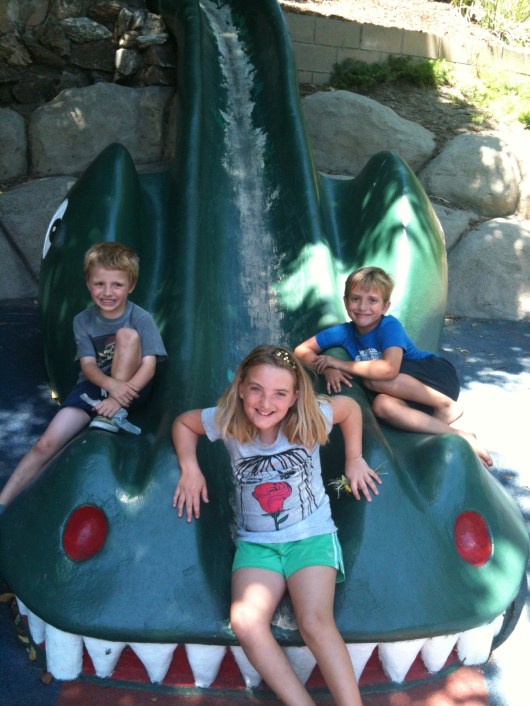 T and friends on the sea dragon slide last week, or four years after his previous visit to Atlantis Play Center.