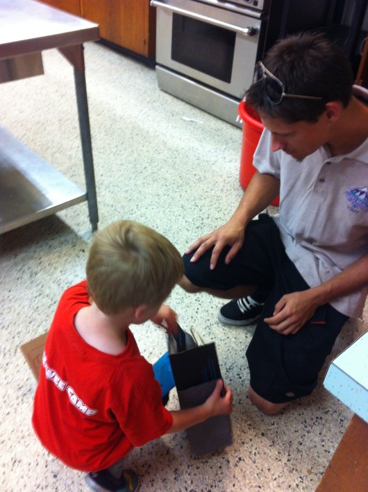 T made a gift for Coach Chris.