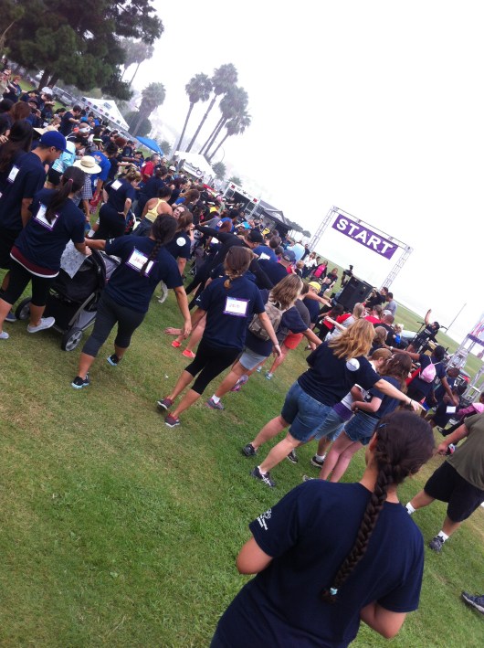 Participants kick off the 2013 iWalk... for Kids with some stretching sponsored by Long Beach Boot Camp.