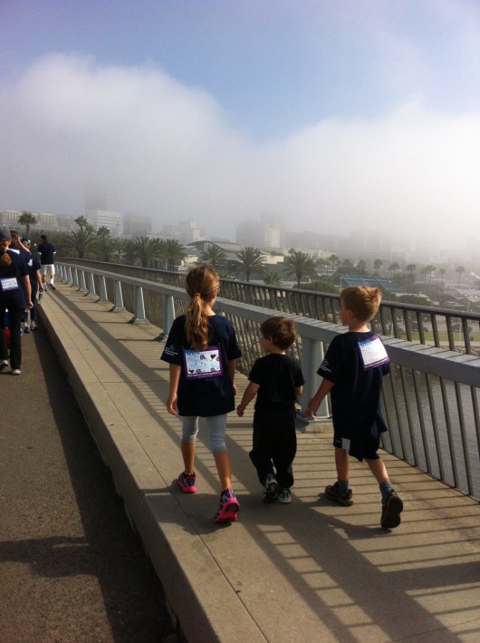 The three kids heading over the Queensway Bridge during the 2013 iWalk... for Kids.