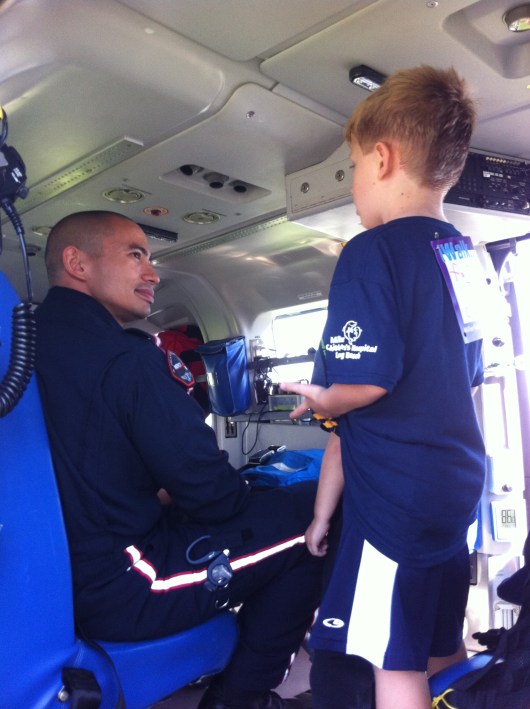 T chats up the Mercy Air helicopter medic at iWalk.