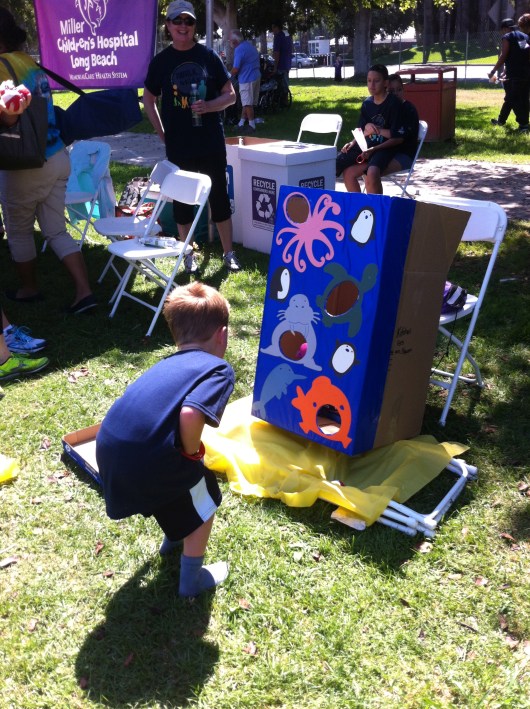 T at the bean bag toss. He's had a lot of practice since we have that yard game "cornhole"!