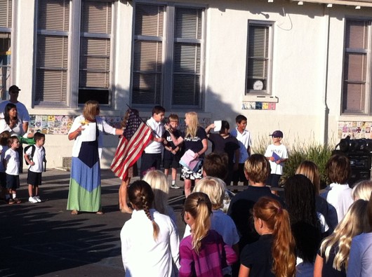 "What's your name?" Principal F asked the two Kindergarten boys holding the flag this week. 