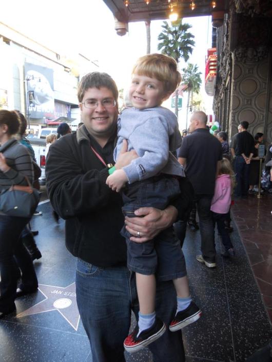 T with Uncle Z outside of the El Capitan Theatre in 2011.