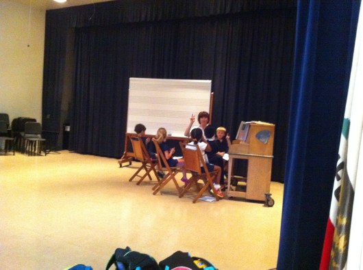 I don't know what they're doing or why they have an index finger up in the air because I snapped this shot on the sly. Well, on the sly until T caught me, that is. Oops!