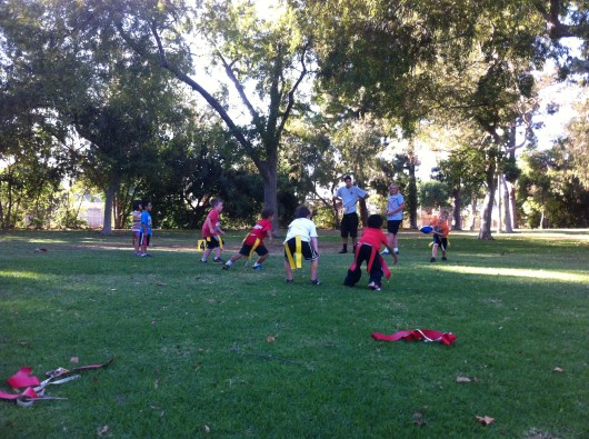 T during a Running Back (RB) drill at flag football practice. He took this one in for a TD!