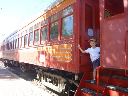 T getting on board an old "Blimp" PE Red Car at the Orange Empire Railway Museum.