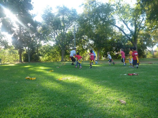 The kids ran through a few different plays at their first flag football practice.