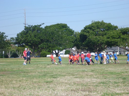 Game on! T's first flag football game gets off to a crashing-good start!